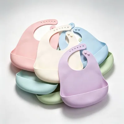 Wholesale Solid Color Silicone Toddler Bib Reusable Easy Clean Drool Bib with Food Pocket for Infant Feeding OEM Custom Logo
