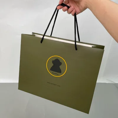 Luxury Paper Bag with Customizable Logo, Recyclable Copperplate Paper & Round Rope Handles for High-end Retail Packaging