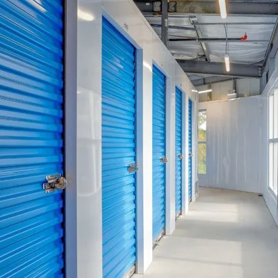 Modern Durable Prefab Steel Self Storage Warehouse Custom Size Secure Commercial Building for Hotel Workshop Use 5 Year Warranty