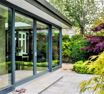Energy-Efficient Sunlight Room: Modern Glass Sunroom with Insulated Panels for Year-Round Comfort