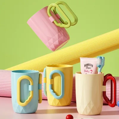 Wholesale Pink Candy-colored Toothbrush Cups Plastic Dispenser with Creative Handles Custom Logos Printing for Hotel & Home Use