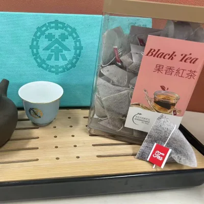 FC60 50g plastic-box peach flavored black tea factory price Negotiable Hot sale High quality pyramid biodegradable BT839 teabag