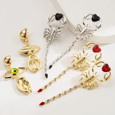 Exaggerated asymmetrical earrings for women with diamond studded scorpion long pendant earrings