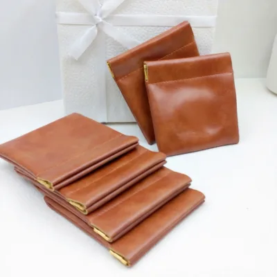 Peiquan New Model PU Automatic Closure Button Bag Bead Bracelet Earphone Data Cable Antique Treasure Packaging Bag Makeup Bag