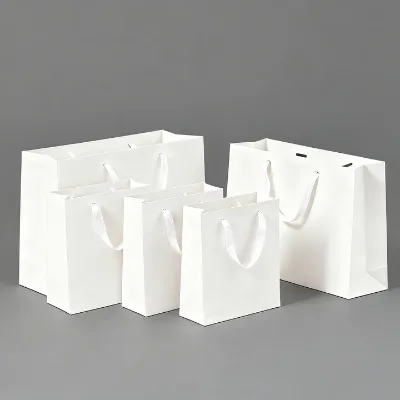 Wholesale Multi-color Plain White Paper Bags Custom Printed Handles Available for Apparel Holiday Gift Retail Packaging Bags