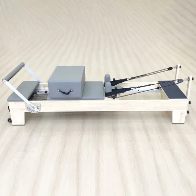 Hot Selling China Oak Pilates Reformer Ergonomic Curved Handrail Neutral Grey Upholstery for Minimalist Boutique Fitness Studio