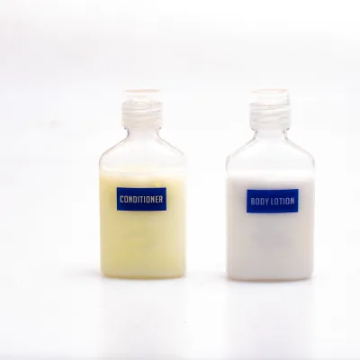Custom Hotel Bathroom Toiletries Mini Hotel Amenities Set Body Care Long Lasting Fragrance 45ml Hotel Body Lotion Conditioner