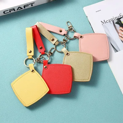 Wholesale Custom Logo Rotatable Square-Shape Pu Leather Pocket Mirror Compact Travel Cosmetic Mirror with Pu Keychain