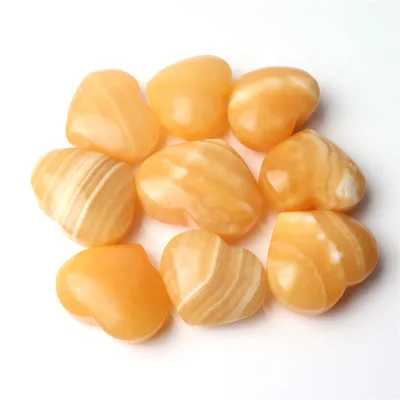 Wholesale natural crystal heart yellow calcite banded heart palm stone for decor