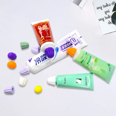 New Design Self-Closing Silicone Toothpaste Cap PVC Travel Toothpaste Squeezer Dispenser for Bathroom Use