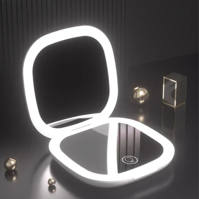 Wholesale Portable LED Makeup Mirror Light Three-Color Light USB Charging Model Folding Handheld Gift Double-Sided Mirror