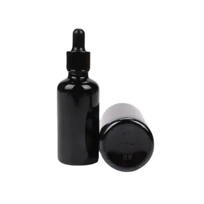 Hot selling from 5ml to 120ml shiny black essential oil glass bottle with round drip and rubber topper