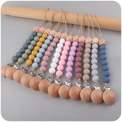 New 1pcs Baby Products Beech Pacifier Clip to Soothe Baby Silicone Bite Molar Wood Star Anise Pacifier Toy Gift