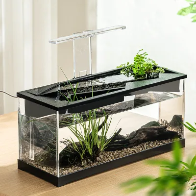 Water feature fish tank with small-scale landscaping, eco-friendly acrylic filter, circulation, heating and lighting integrated