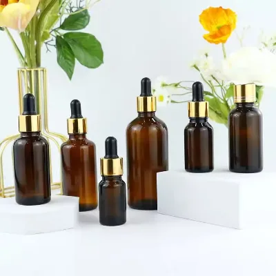 2 oz Amber Clear Essential Oil Glass Gold Spiral Bottle Amber Empty Glass Bottles with Aluminium Gold Cap
