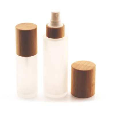Supplier of Cosmetic Transparent Frosted Glass Pump Spray Lotion Bottle With Bamboo Lid For Lotion