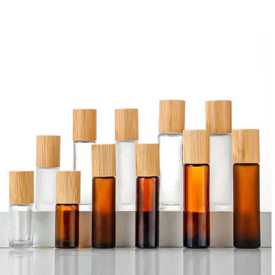 Eco-Friendly 5ml 10ml 15ml Glass Roll-on Bottles with Bamboo Lid for Essential Oils Clear Perfume Sample Screen Printing Surface