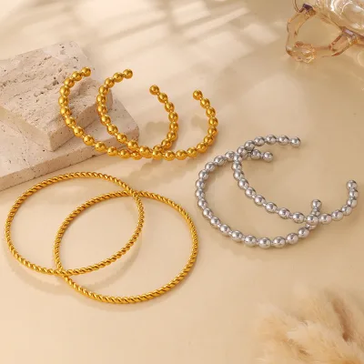 European and American cross-border fashion, simple everyday round bead twist design bracelet, stainless steel plated with 18k