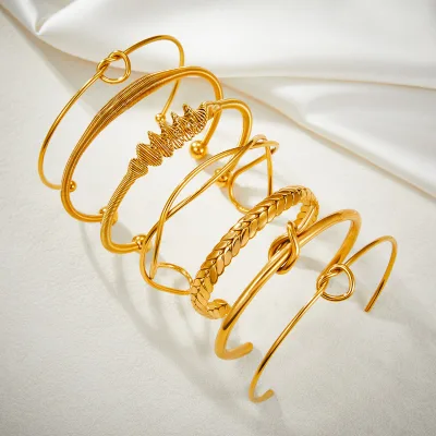 2025 New 18k Gold Pvd Coated Stainless Steel Jewelry Knot Minimal Irregular Bangle Spring Wire Indian Bangles Bulk ALN25120784