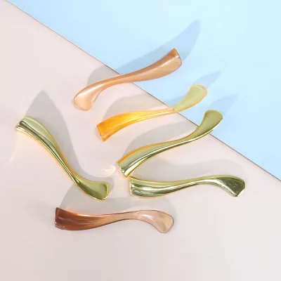 2024 Luxury New Cosmetic Skincare Eye Face Cream Spoon Plastic Packaging Makeup Massage Stick Facial Mask for Sale