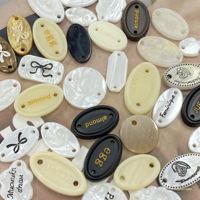 Custom Eco-Friendly Sewing Buttons 2-Hole Resin Oval White Square Pattern Fashion Garment Accessory with Bow Button for Clothing