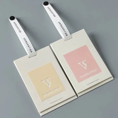 Custom clothing tags with anti-removal clasp Custom clothing anti-theft clasp and tags with synthetic material