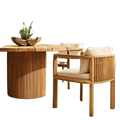 Modern Durable Teak Round Table with Grooved Pedestal Frame and Striking Vertical Detail for Outdoor Use