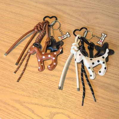 Ins-style PU leather keychain with polka dots Minimalist PU Leather Dalmatian Dog Keychain with Braided Cord & Bone Charm