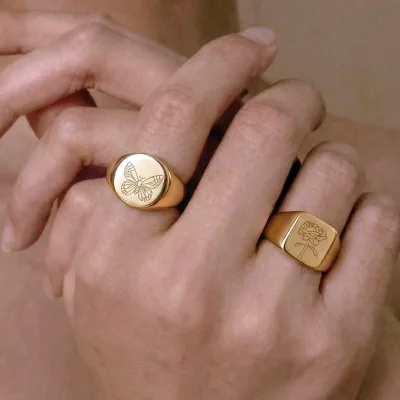 Vintage-style 18K Gold-plated Stainless Steel Ring Set Featuring butterfly and Camellia Engravings.