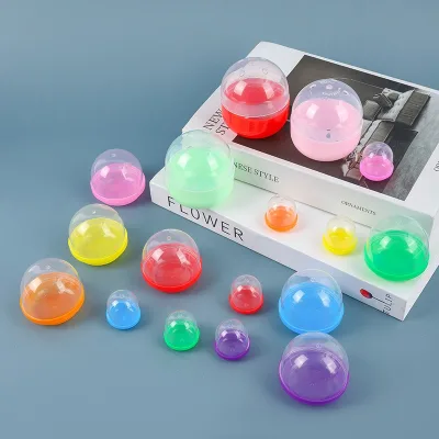 2026 Top Sale Factory Wholesale Funny 1 Inch 26*32mm Flat Plastic Capsule Ball Shells Kids Vending Machine Promotional