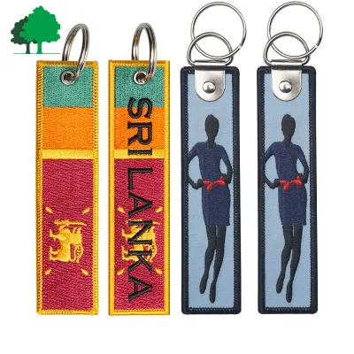OEM Airline Promotion Embroidered Fabric Key Chain Custom Logo Merrow Edge Souvenir Ornament Key Chain