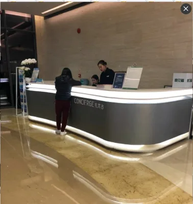 Europe style hotel reception counter custom wood service cashier counter on hall LED light on foot