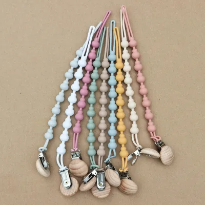 New Pacifier Clip Holder Soft Flexible Silicone Baby Pacifier Holder Wooden Clips with Texture for Boy and Girl
