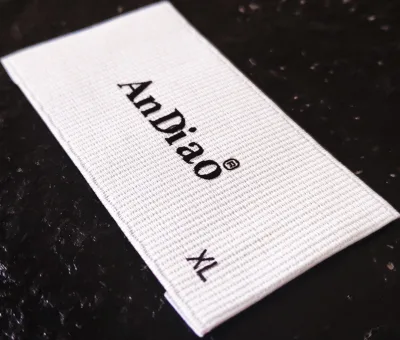 Custom eco friendly designed woven label/tag/customized iron on clothing embroidered logo/satin /silk printing for clothing
