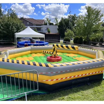 Inflatable Toxic Meltdown Interactive Games Inflatable Jumper Rotating Obstacles Game PVC Wipeout Game for Kids and Adults
