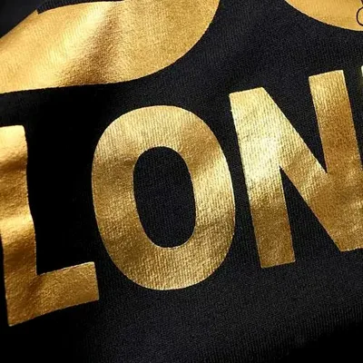 High Quality Custom Metallic Shinny Gold Dtf Het Transfer Heat Press Iron On Labels For Hats T Shirt