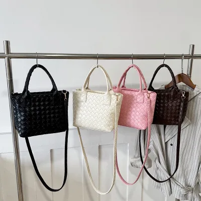Minimalist Design Light Luxury PU Woven Bucket Type Basket Bag 2026 Spring Stylish Textured Single Shoulder Crossbody Handbag