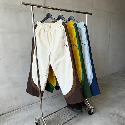 High Quality Custom Loose Causal Nylon Track Pants Streetwear Trousers Stitching Color Elastic Waistband Nylon Jogger Pants Men
