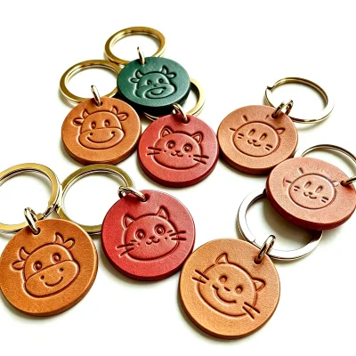 Custom Cute Cartoon Design Round Shape Leather Keychain cat Cow Debossed Leather Key Tags