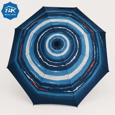 Art styled golf umbrella featuring vibrant concentric blue wave print Wind resistant double canopy for brand giveaways.