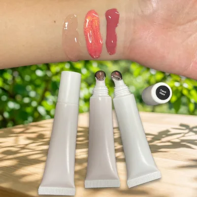Wholesale Hot Selling Private Label Lip Gloss Lip Glaze Custom Logo White Squeeze Tube Durable Metal Head Cosmetic Lip Gloss