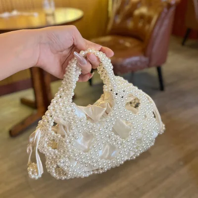 Socialite Pearl Woven Hollow Small Drawstring Satin Inner Bag 2026 New Handbag Elegant Handmade Bead Women's Cheongsam Handbag
