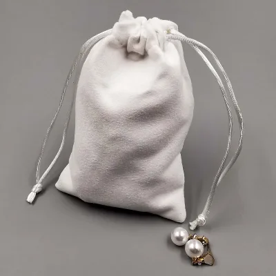 White Luxury Velvet Drawstring Gift Bags for Perfume Bottle and Jewelry Custom Logo Printed Elegant Jewelry Container