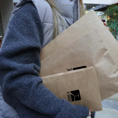 Wholesale Custom Printed Self Seal Express Packaging Kraft Paper Mailing Bag for Apparel Garment Shoes Online Shop Shipping