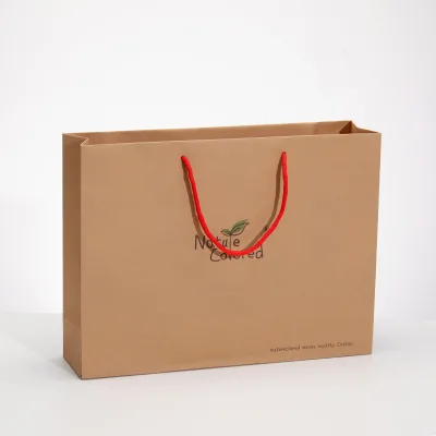 Custom Logo Wholesale Luxury High-grade Kraft Paper Gift Packaging Bags with Handles Jewelry Luxury High-grade Shopping Bags