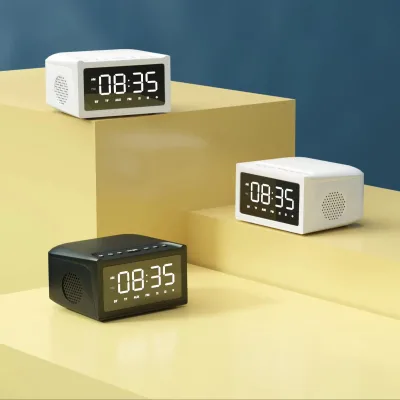 Hot Selling Best Price Multifunctional Speaker for Phone for Office Wireless Charger Alarm Clock LCD Display FM