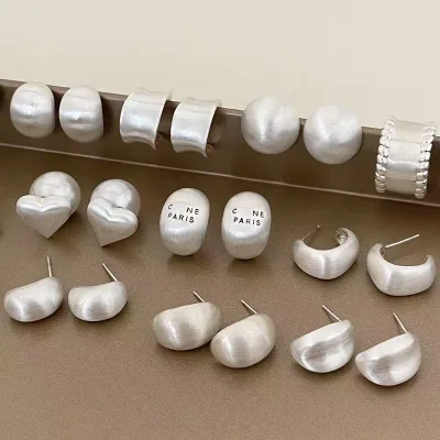 Lady's ear studs are light luxury silver colour metallic studs