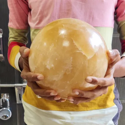 Hot Sale Natural Yellow Spiritual Crystal Spheres Polished Orange Calcite Energy Ball Crystal Honey Calcite for Decoration