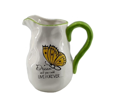 Ceramic water pitcher with butterfly decoration