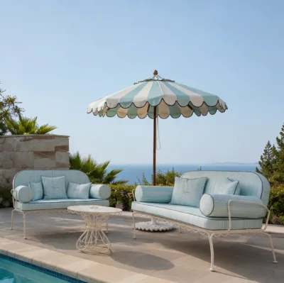 Light Blue Striped Metal Outdoor Garden Sofa Set Coffee Table Scalloped Patio Umbrella Throw Pillows Pool Seaside Villa Resort